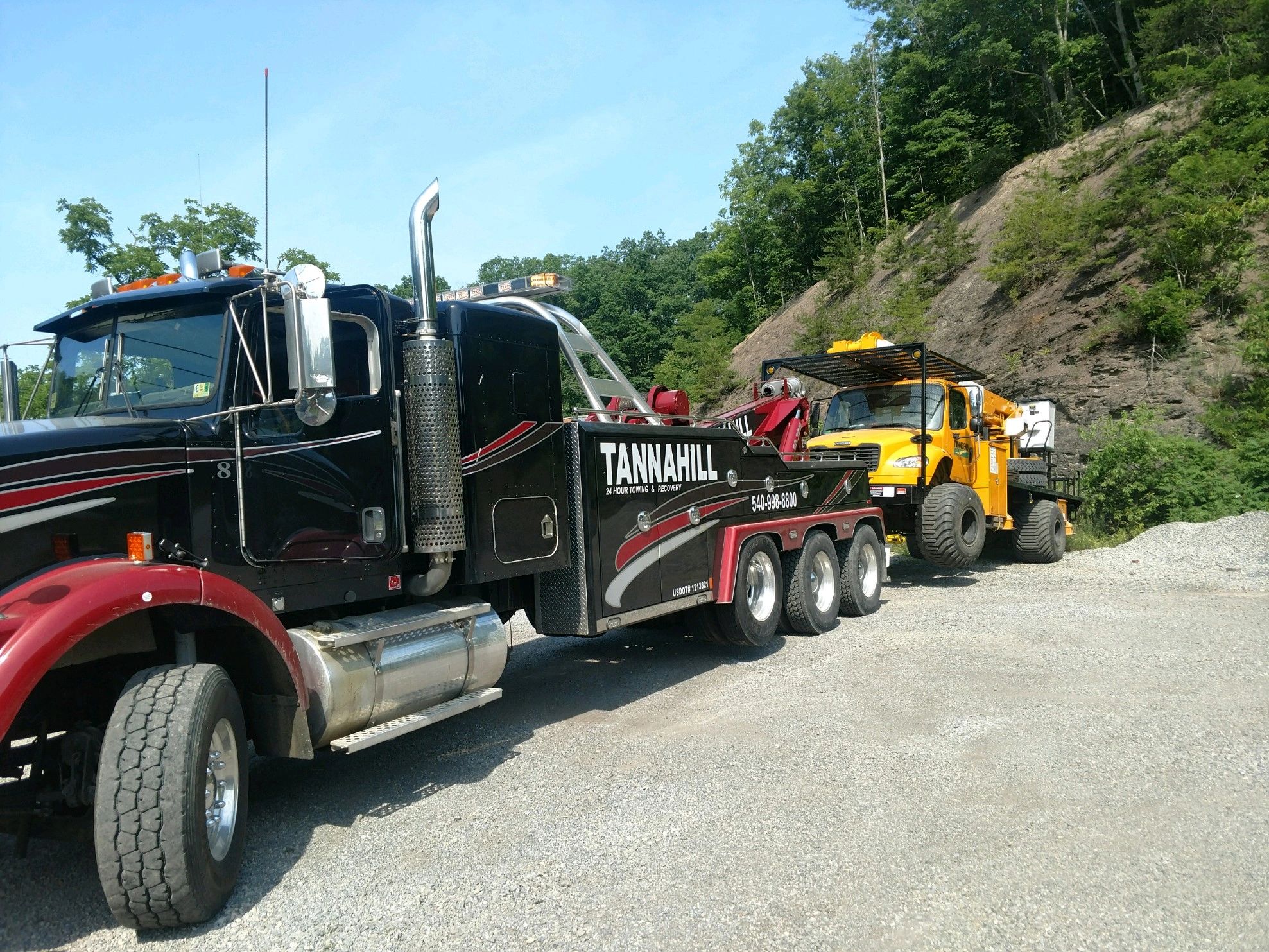 Tannahill Towing heavy equipment fleet at job site
